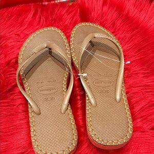 Havaianas Tan Flip Flops with Gold Accents